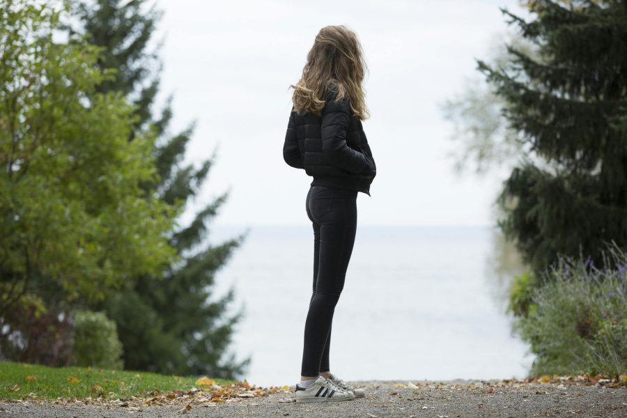 Photo of Woman Standing on Road